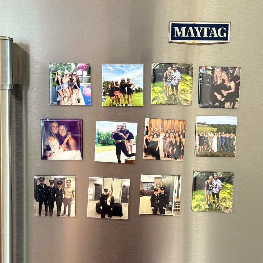 Grid of custom 2×2 photo magnets displayed on a stainless steel refrigerator
