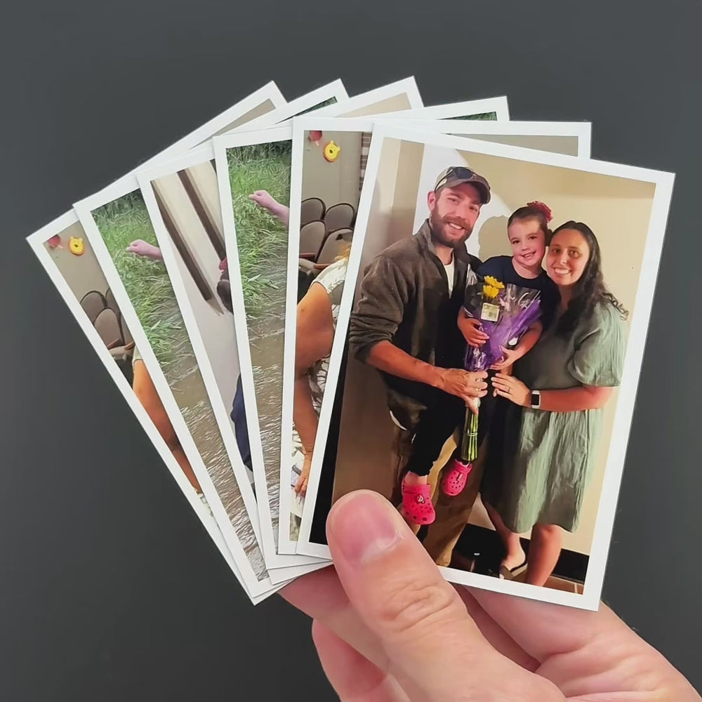 Video showing a hand fanning a set of custom flexible photo magnets